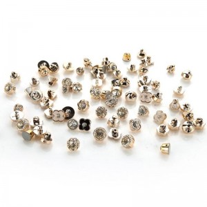 أحدث بيع رائعة الإبداعية طليعي الملابس زر الأزياء السائبة أزرار حجر الراين الأشعة فوق البنفسجية