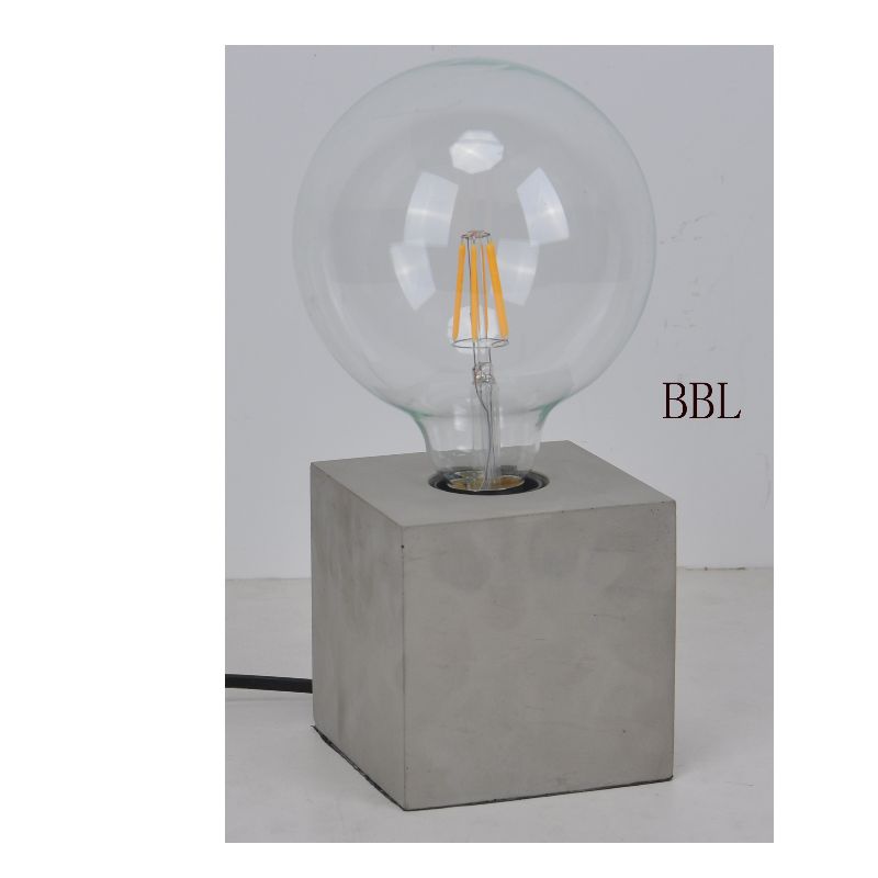 مصباح طاولة بقاعدة خرسانية مربعة