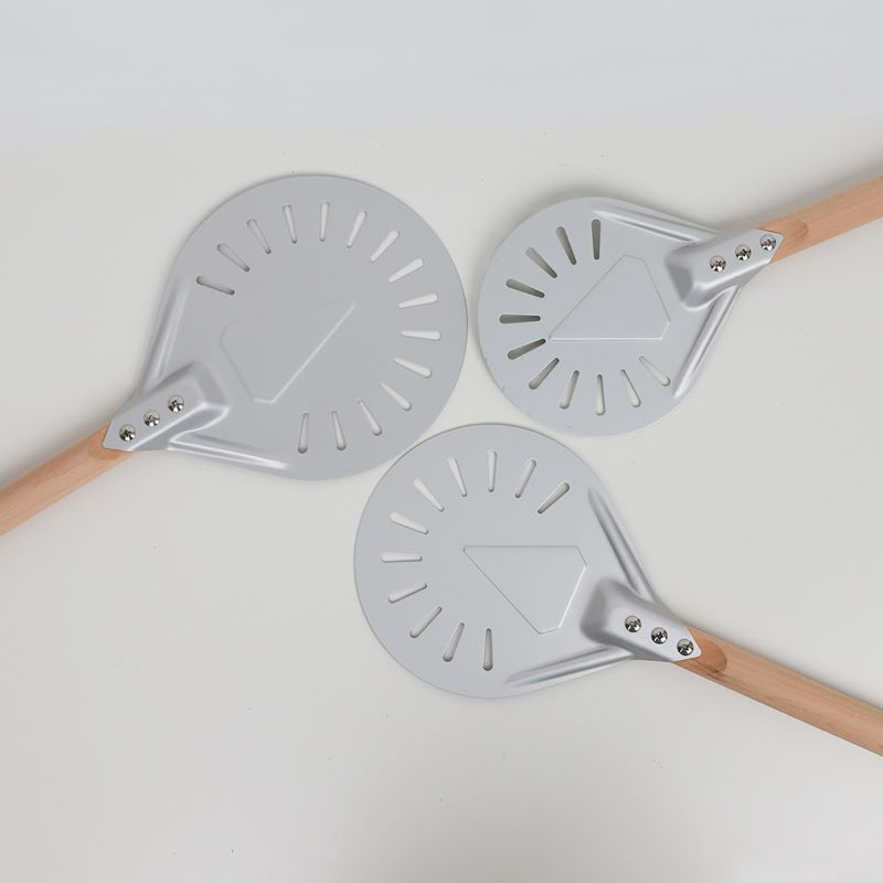 1670891381.jpg Perforated round pizza paddles.jpg
